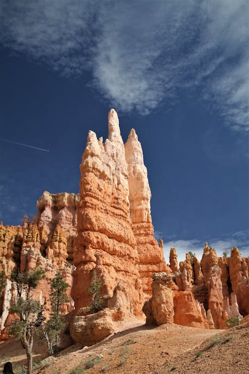 Crimson Colored Hoodoos Under Blue Sky