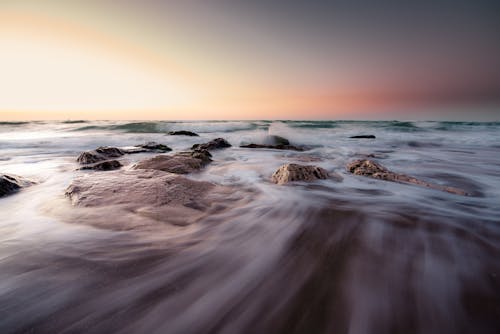 Free stock photo of curves, sea, stones