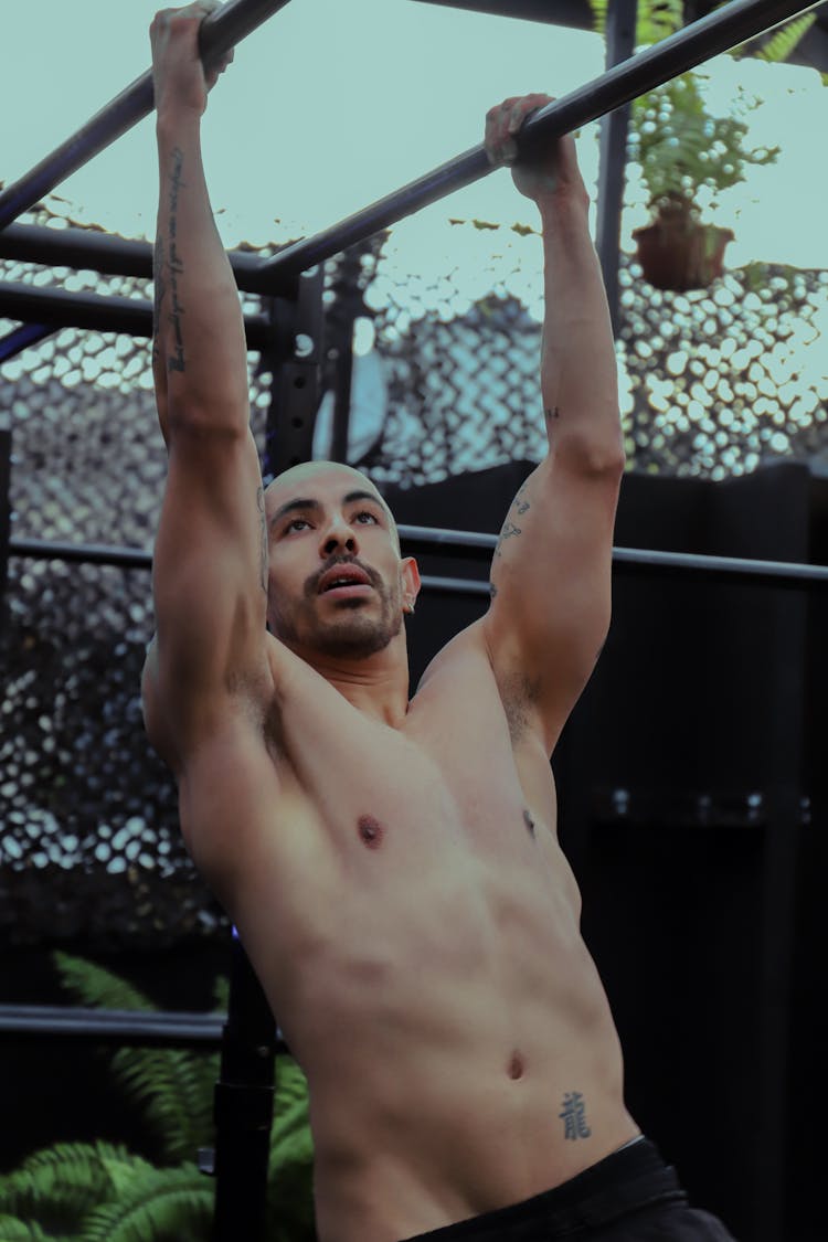 Shirtless Man During Bodybuilding Training