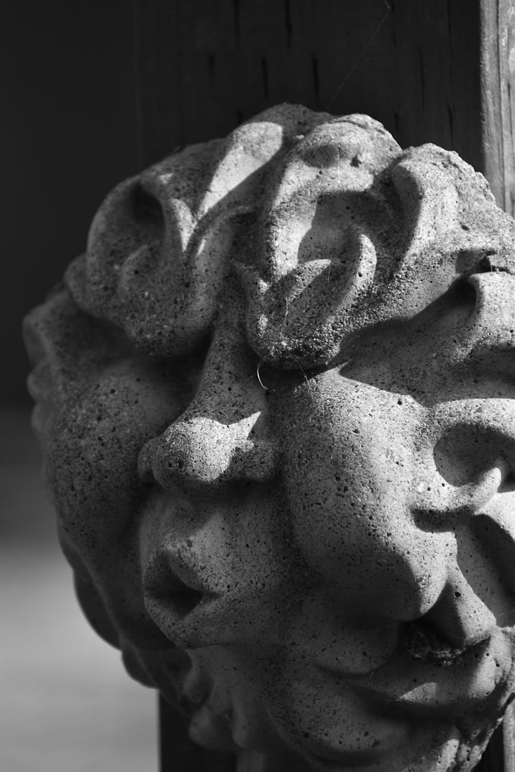 Gray Sculpture In Close-up Photography