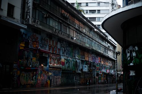 Free Colorful street graffiti fills a city alley, showcasing urban creativity and expression. Stock Photo