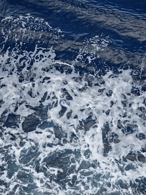 Close Up Photo of Blue Water Splashing