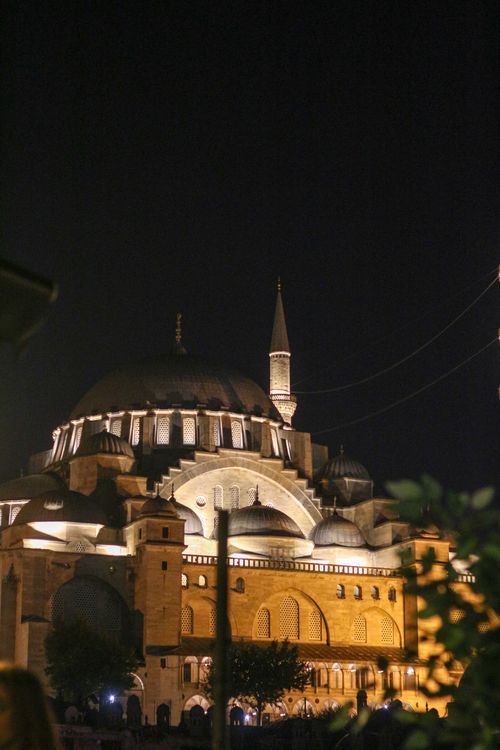 Free Elegant night shot of the historic Suleymaniye Mosque in Istanbul, capturing its illuminated architecture. Stock Photo