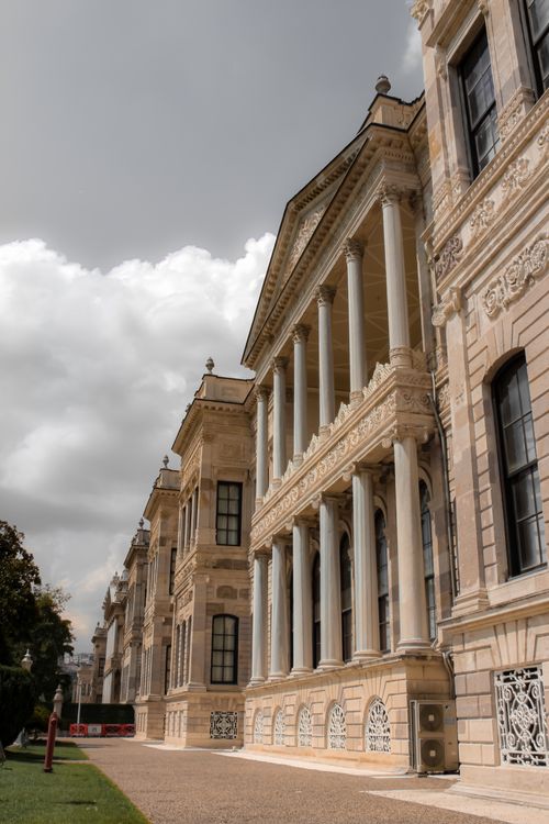 Free Explore the stunning neoclassical architecture of Dolmabahçe Palace with its impressive columns in Istanbul, Turkey. Stock Photo
