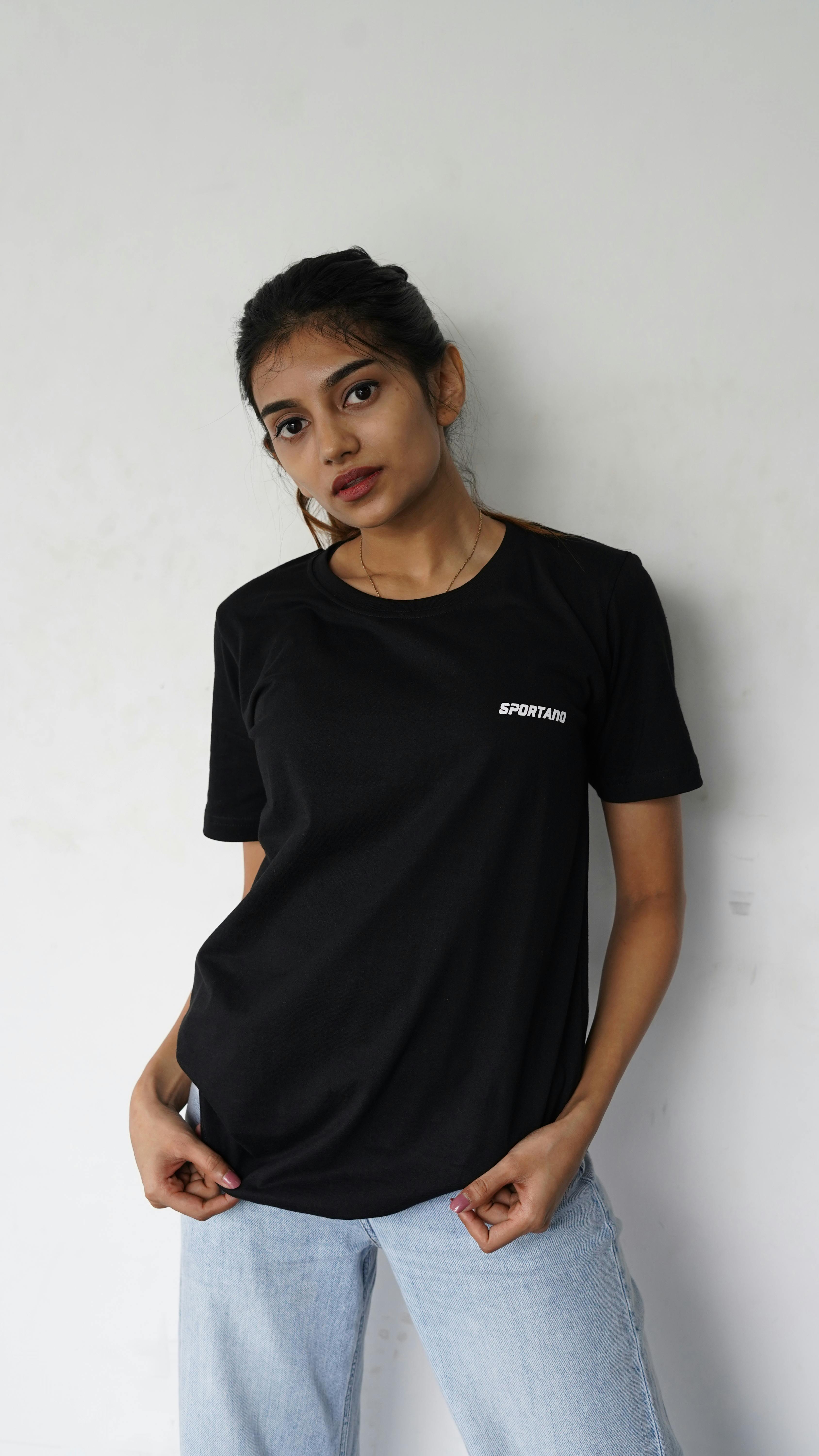 Girl Wearing Black Shirt on White Background · Free Stock Photo