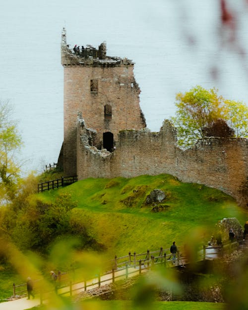 Person Looking at The Ruins of a Castle 