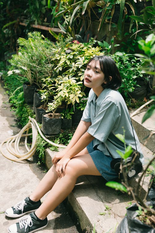 A Girl Sitting on the Stairs