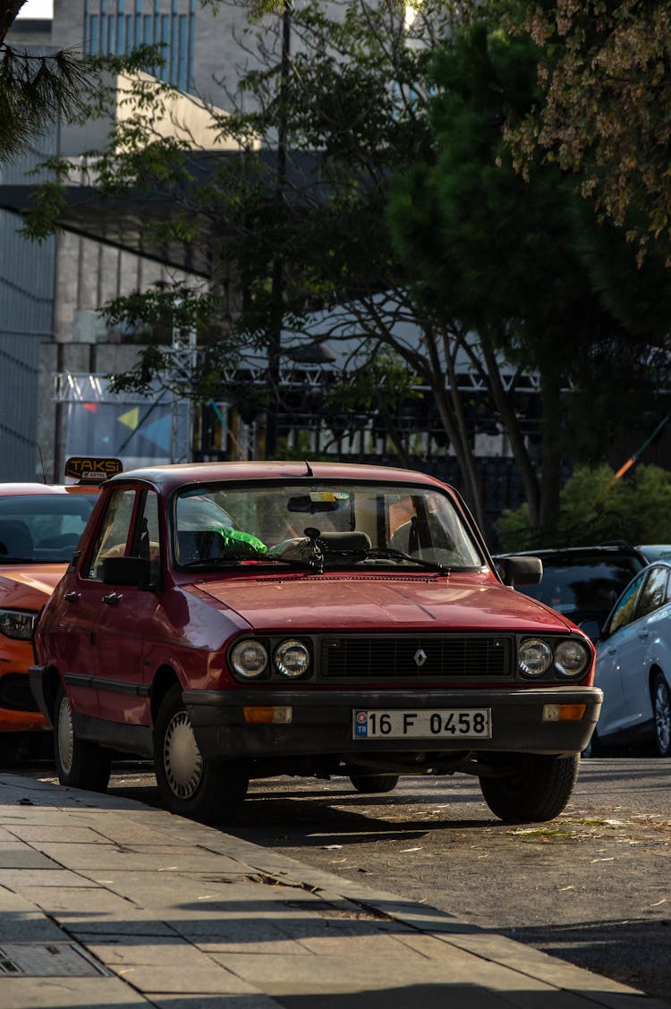 Old Car Parked On Street