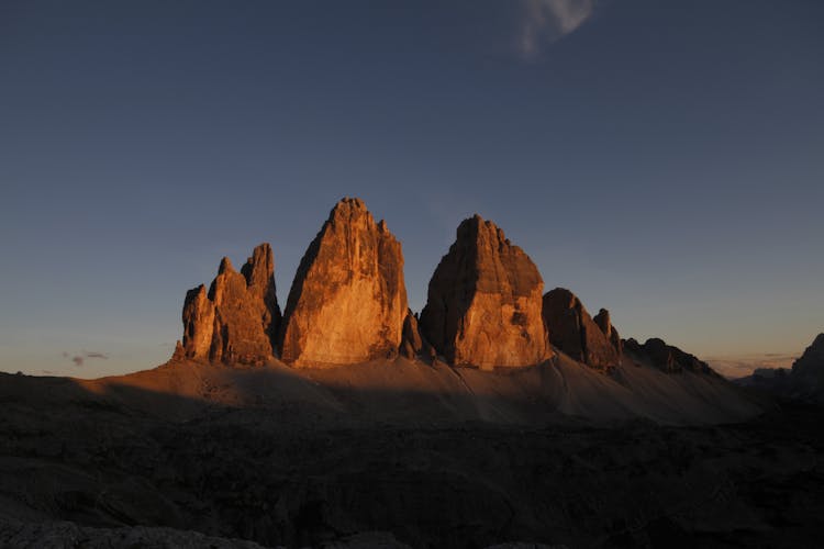 Rocks In Mountain Landscape On Sunset