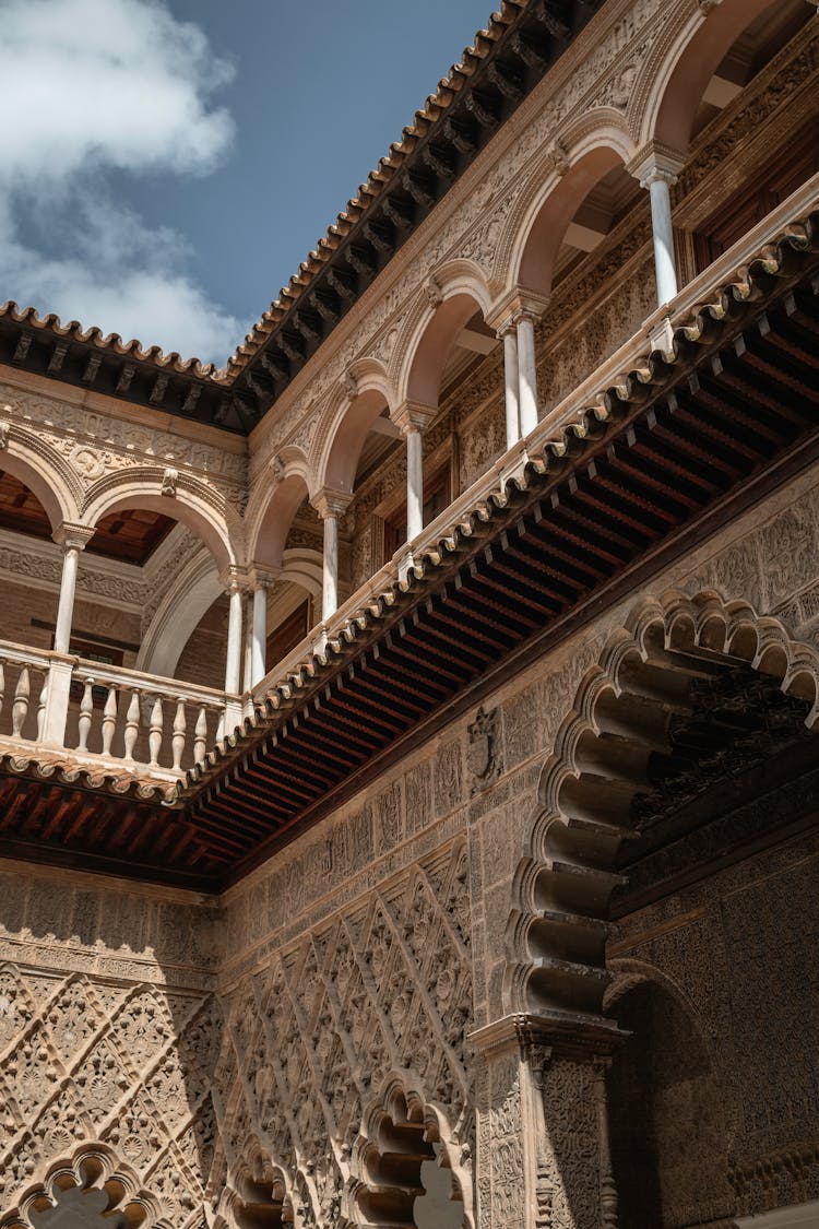 Courtyard In Royal Alcazar Of Seville In Spain