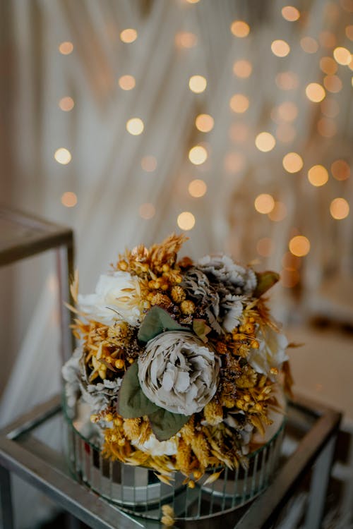 Flower Vase over a Glass Table