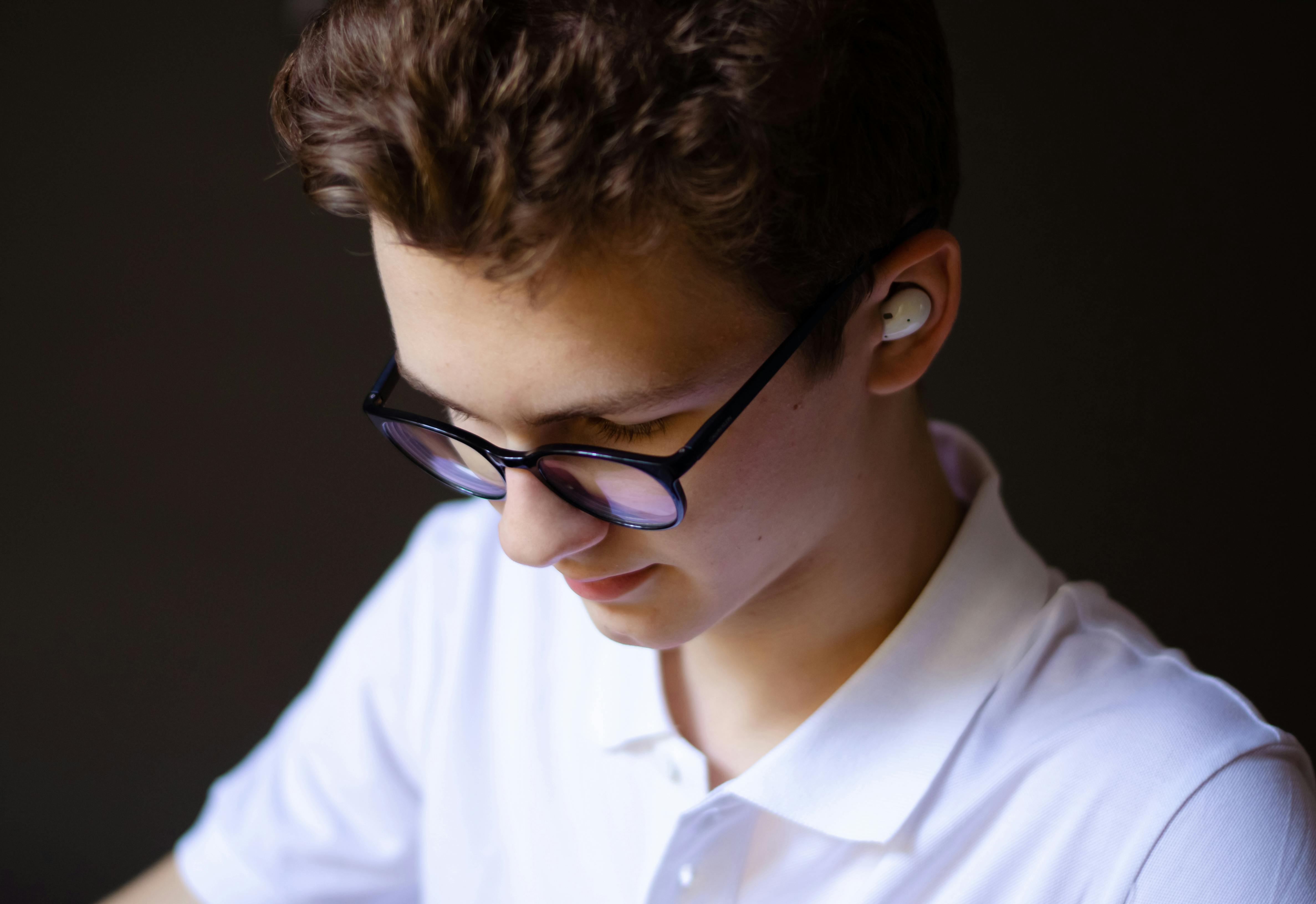 young boy in eyeglasses