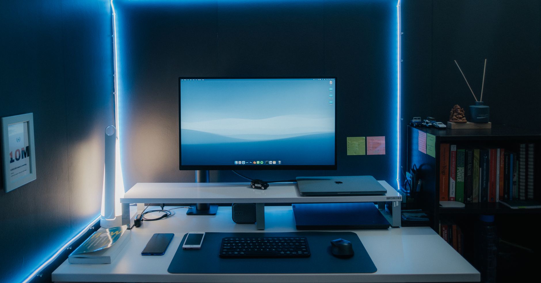 Sleek home office setup with monitor, laptop, and LED lights, perfect for productivity.. pexels, sleek, home