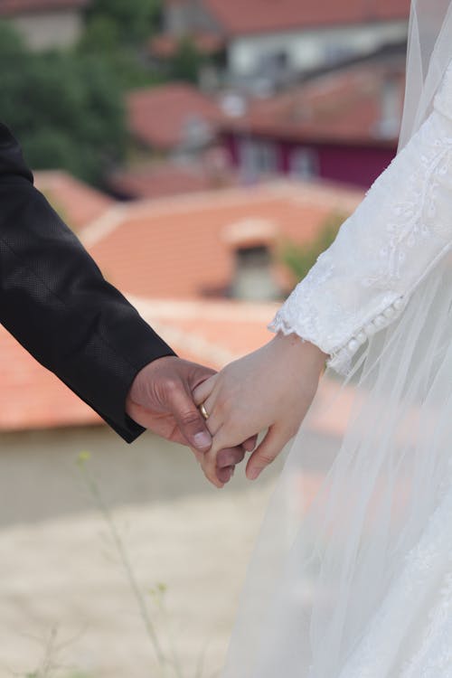 Free Close Up Shot of a Couple Doing Holding Hands Stock Photo