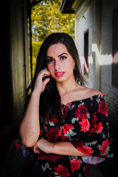 A Woman in Floral Dress with Makeup