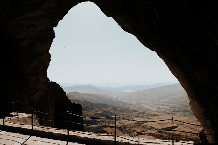 Railing Near A Cave Opening