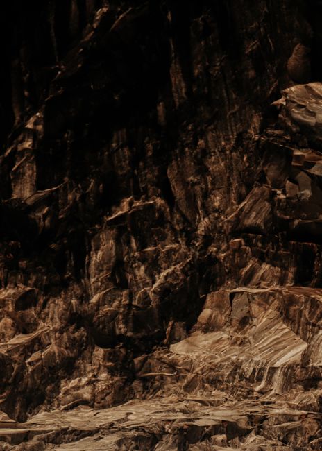 Dynamic rock formation showcasing natural texture and geological features.