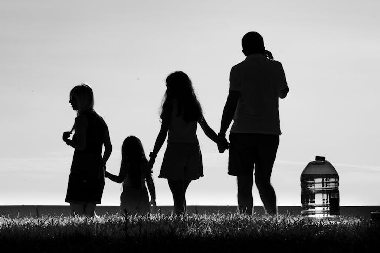 A Silhouette Of A Family