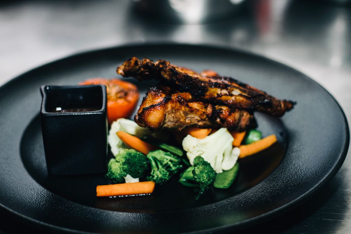 Eating Delicious A Close-Up Shot of a Delicious Meal · Free Stock Photo