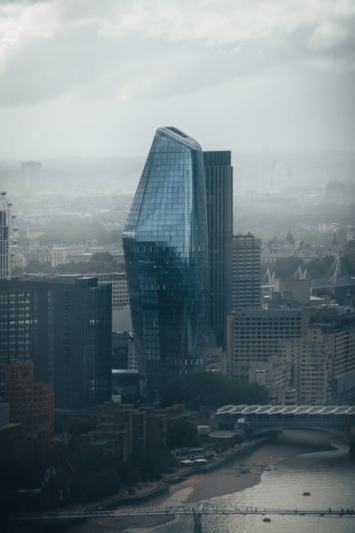 High Rise Building Under a Cloudy Sky