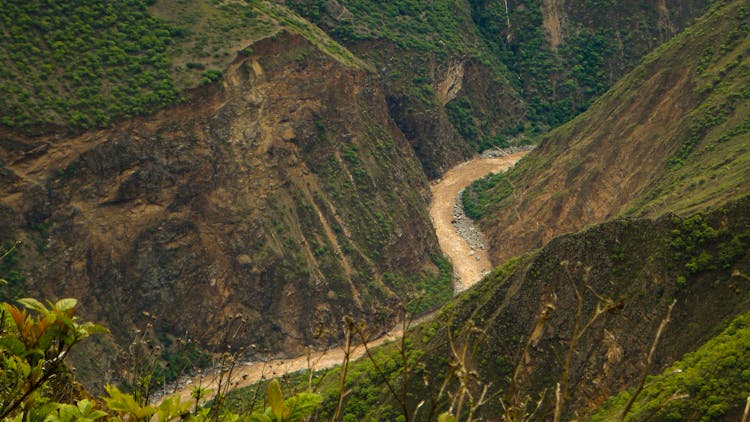 River In Between Mountains