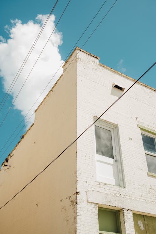 White Concrete Building Under Blue Sky