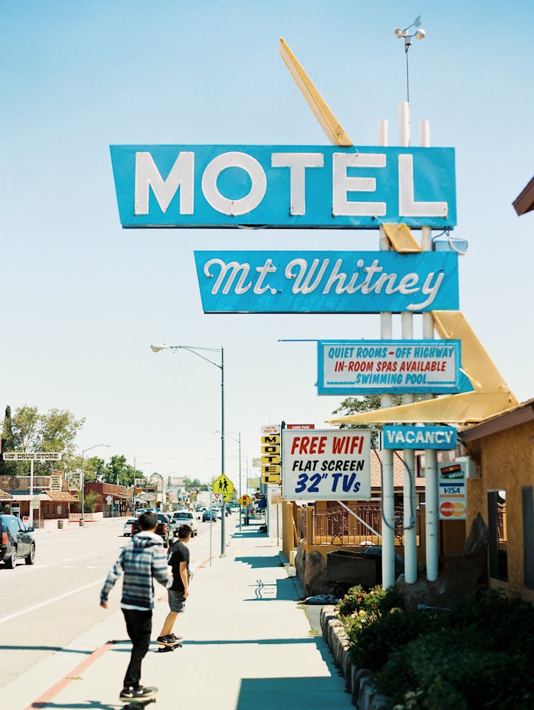 Old Motel Sign On Town Street