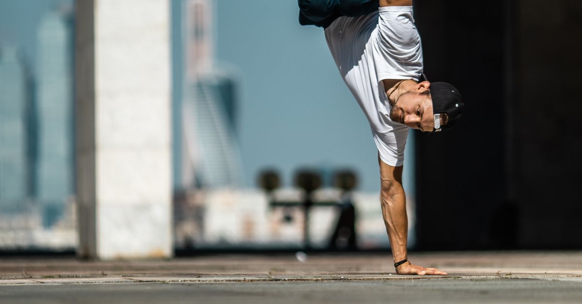 Man Taking Photo Using One Hand A Man Doing Handstand Using One Hand · Free Stock Photo