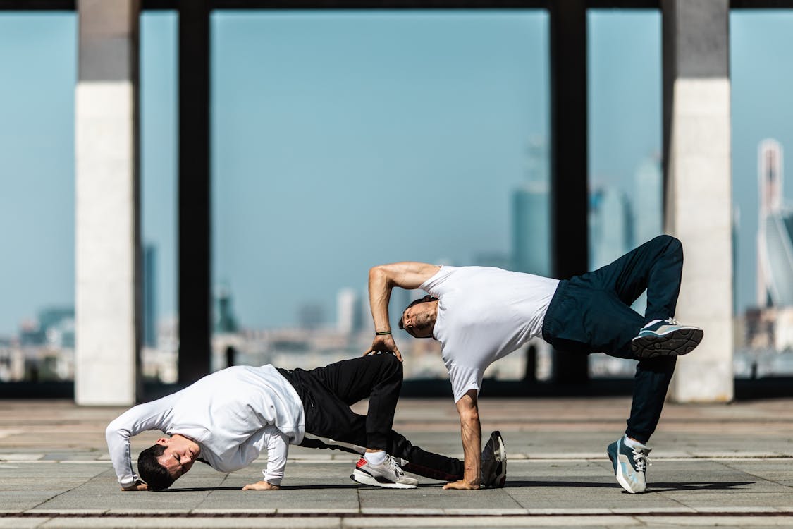 Free Men Breakdancing on the Street Stock Photo