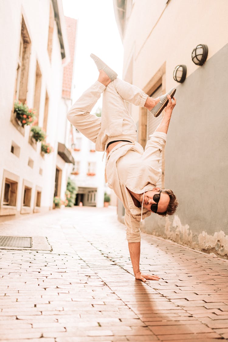 Man Upside Down Balancing On Hand