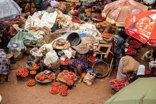 Colorful market depicting daily life in Ibadan, Nigeria with fresh produce and bustling activity.
