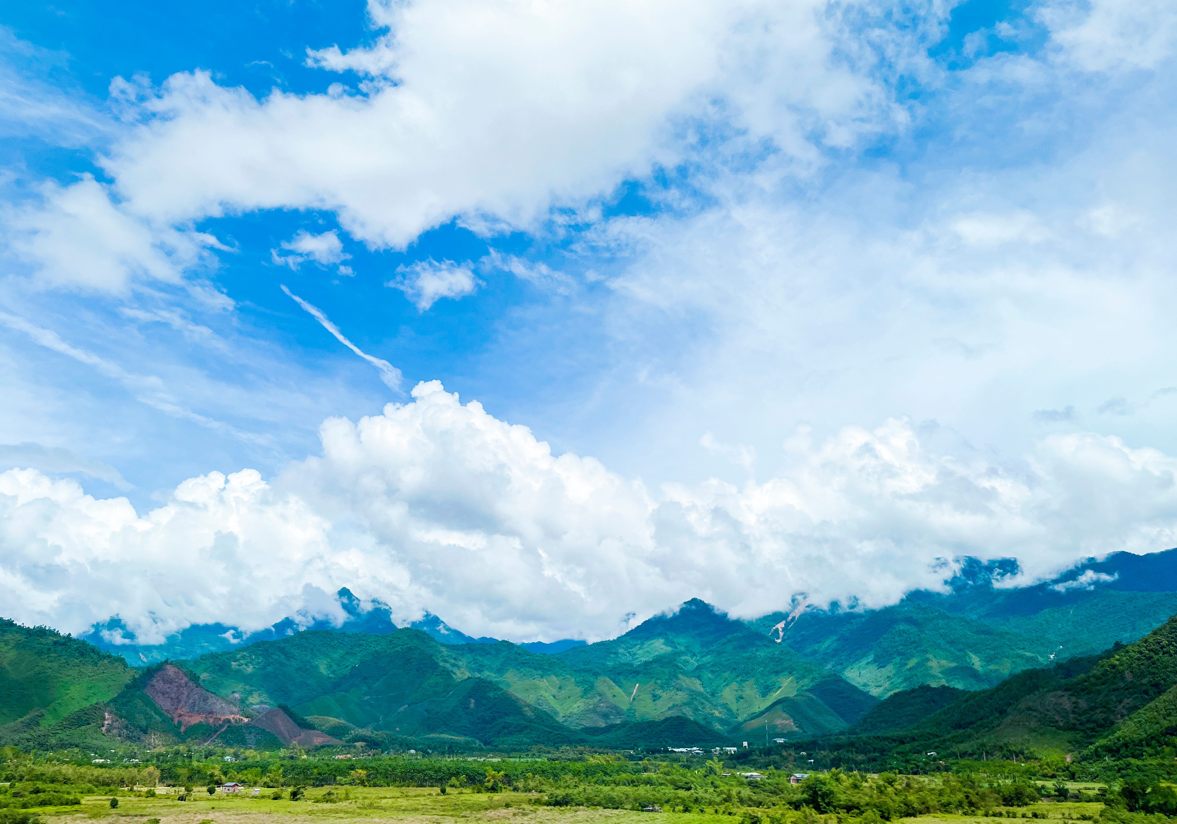 Landscape of Mountain Photographed from a Green Valley · Free Stock Photo