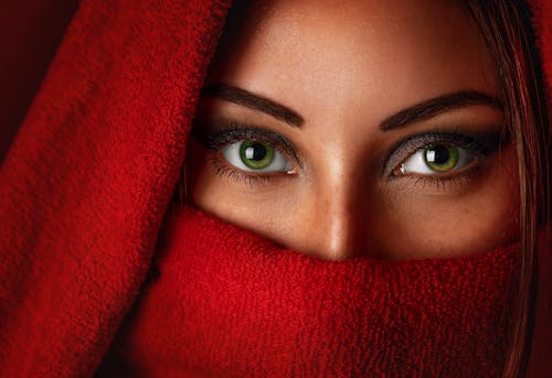 Portrait of Woman Wearing Red Headscarf 