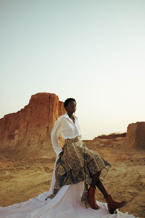Woman Posing in Desert Landscape