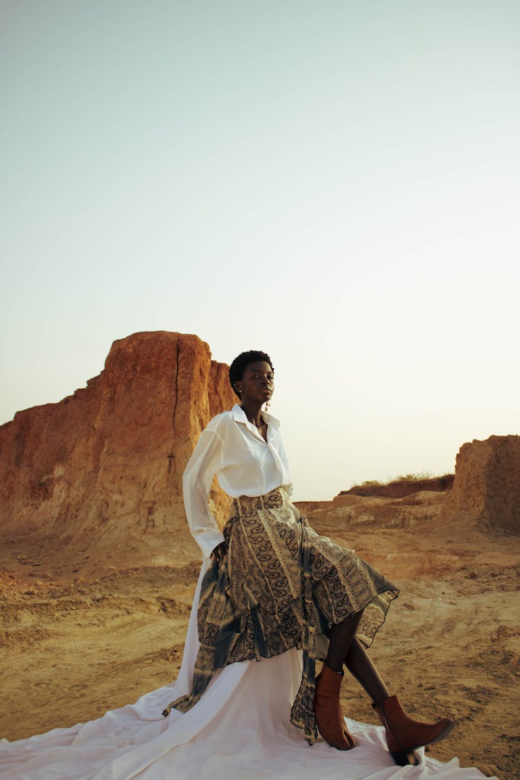 Woman Posing In Desert Landscape