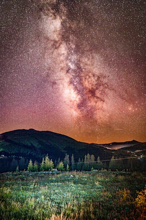 Gratis Fotos de stock gratuitas de cielo nocturno, estrellas, montañas Foto de stock
