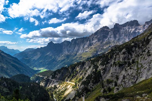 Aerial Photography of Mountains under the Cloudy Sky