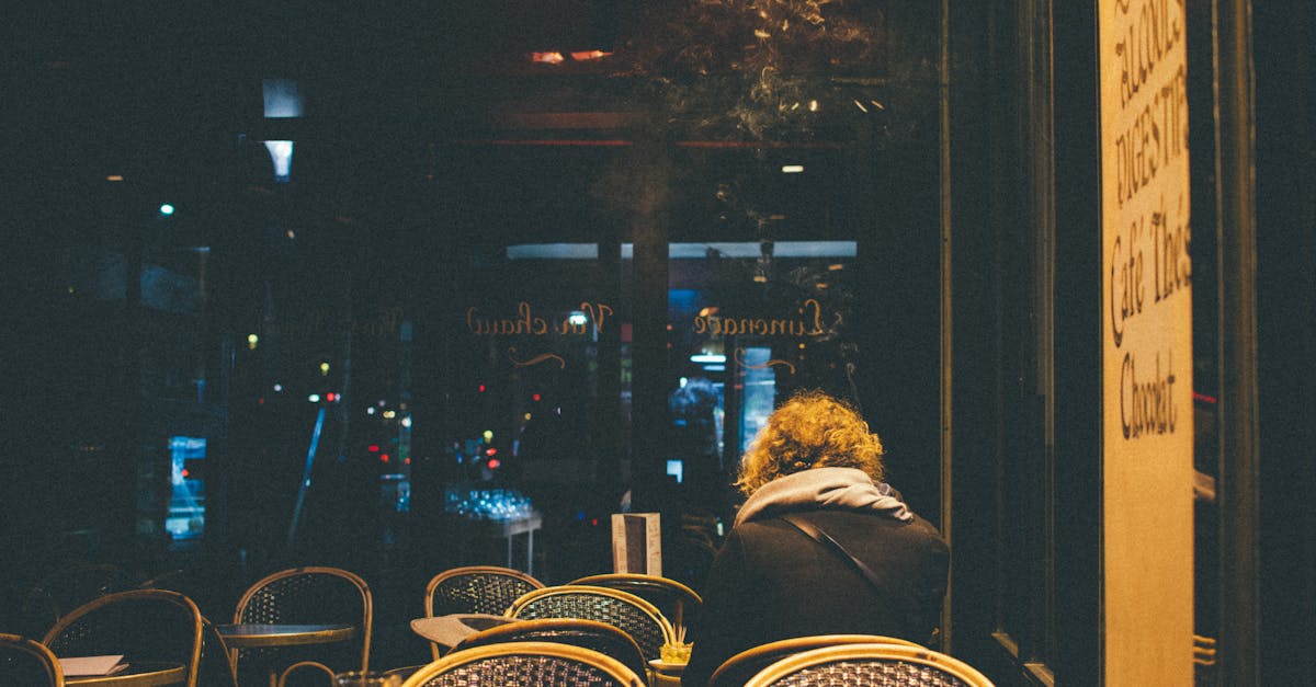Person Sitting on Brown Chair