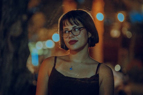 A Portrait of a Pretty Woman in a Spaghetti Strap Top