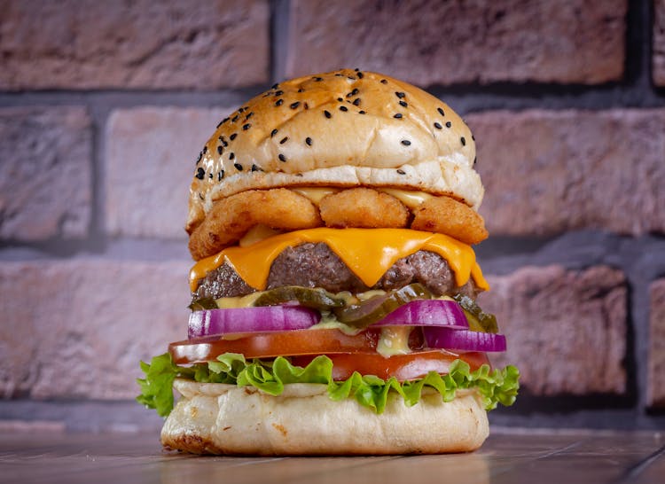 Macro Photography Of Nuggets Cheeseburger Sandwich