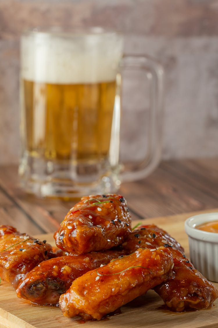 Chicken In Sesame Sauce And Beer Glass