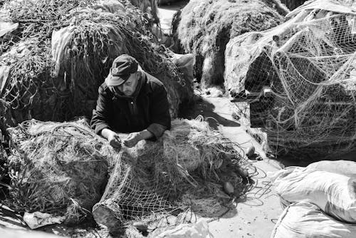 Photo of a Fisherman with a Net 