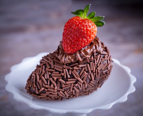 A Chocolate Cake with a Strawberry