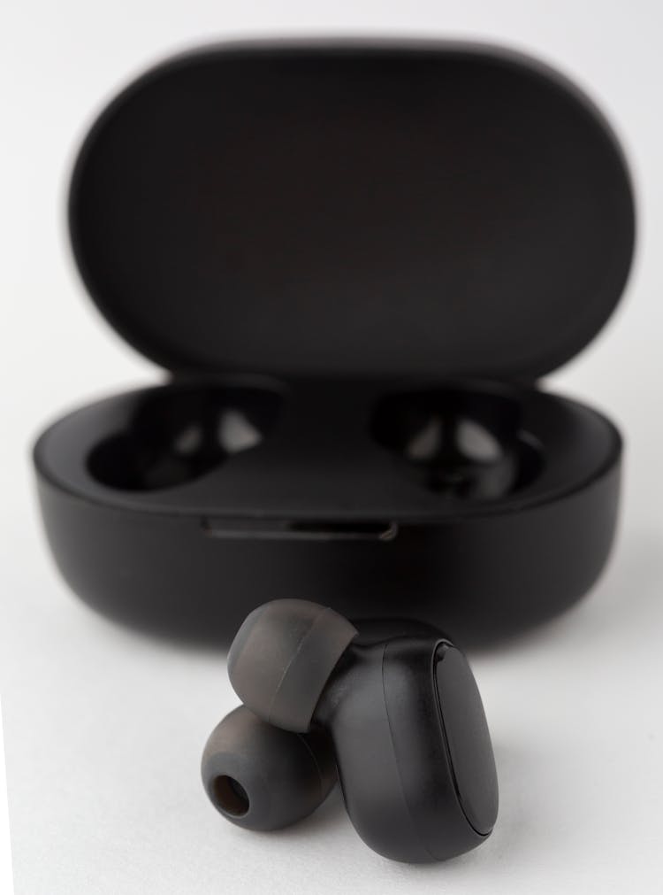 Close-Up Photo Of Wireless Earphones