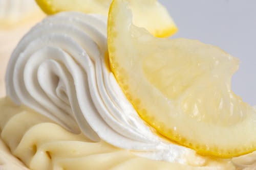 Close-up of Lemon on Cream on Dessert