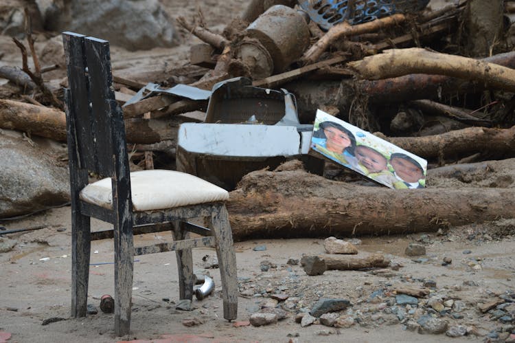 Broken Chair And Rubble After An Earthquake 