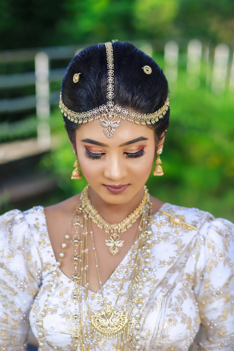 Woman With Golden Jewelry