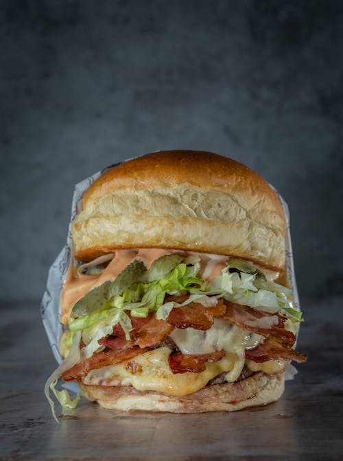 Kostnadsfri bild av bulle, burger, fet mat