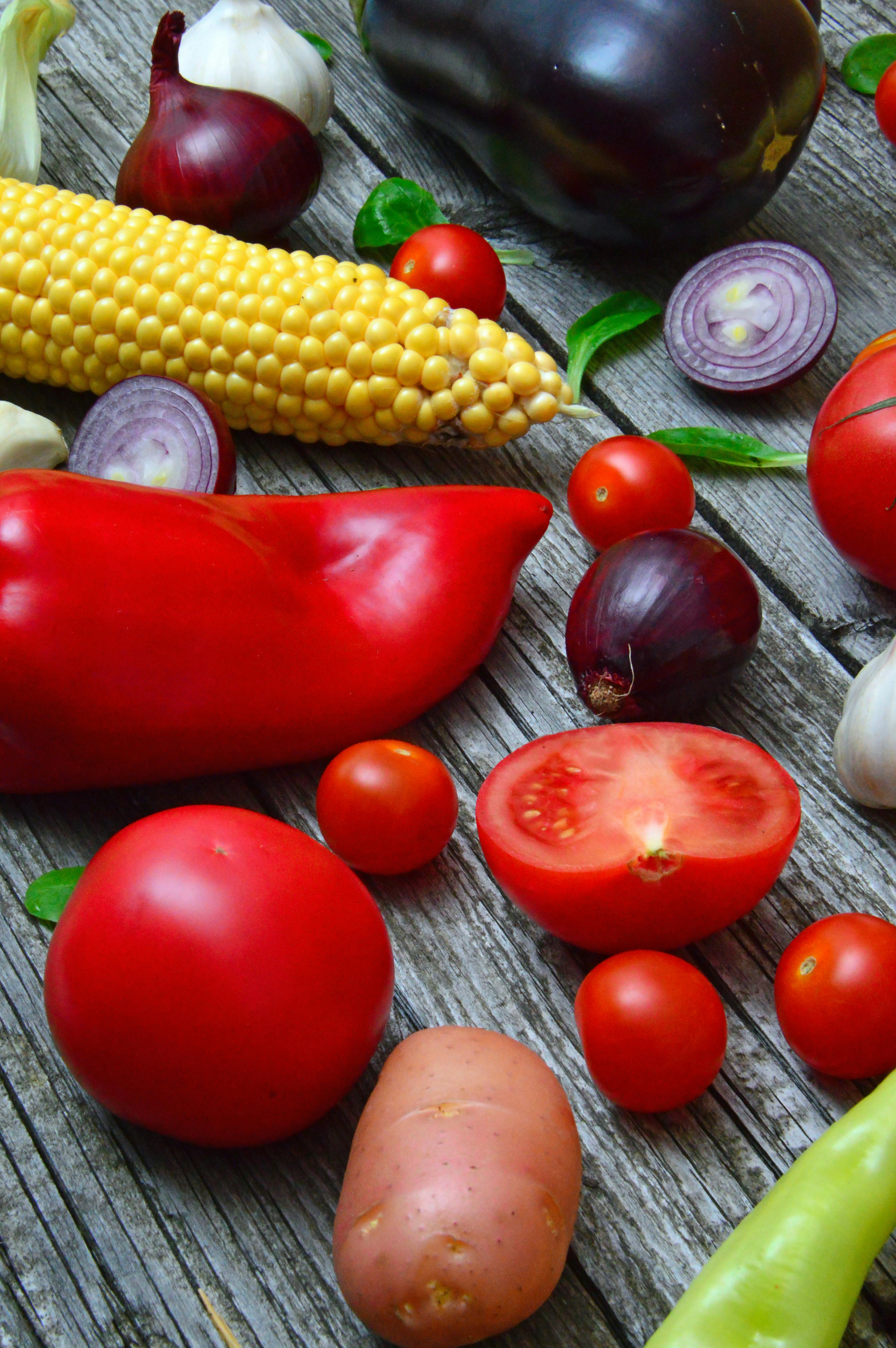 assorted color ingredients on grey wooden table