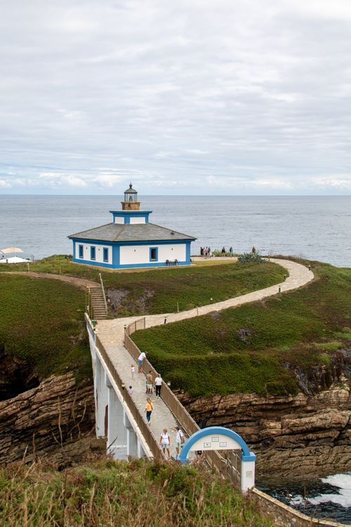 Free Scenic view of the lighthouse on Pancha Island, Ribadeo, Spain highlighting coastal beauty. Stock Photo